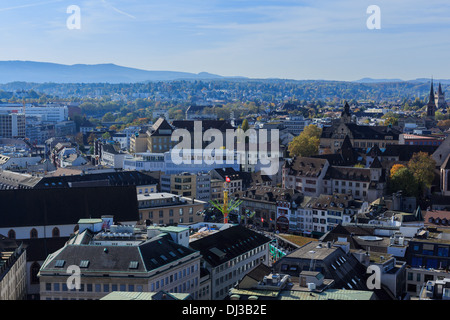 A photograph of the skyline of Basel, Switzerland. Taken at the start of the Autumn fair on a beautiful sunny day. Stock Photo