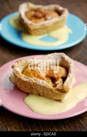 Walnut pear tart with a vanilla custard sauce.