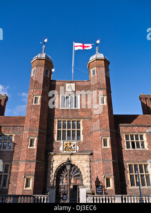 Abbot's Hospital a Jacobean alms house flying the cross of Saint George flag  High Street  Guildford, Surrey, England Stock Photo