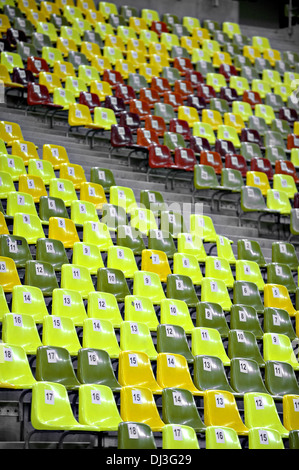 Empty stadium colored seats with nocturne lights reflections Stock Photo