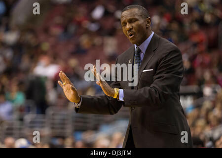 Philadelphia, Pennsylvania, USA. 20th Nov, 2013. Toronto Raptors head coach Dwane Casey reacts from the sidelines during the NBA game between the Toronto Raptors and the Philadelphia 76ers at the Wells Fargo Center in Philadelphia, Pennsylvania. The Raptors win 108-98. (Christopher Szagola/Cal Sport Media/Alamy Live News) Stock Photo