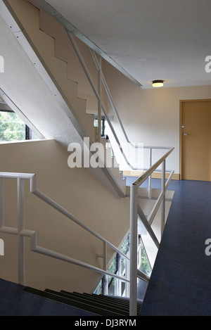 The Florey Building, Oxford, United Kingdom. Architect: Sir James Stirling, 1971. Interior staircase. Stock Photo