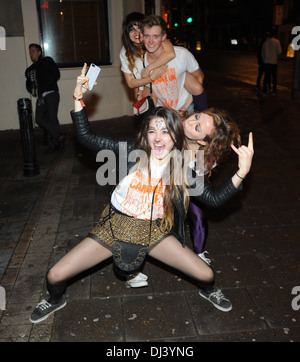 University students in Brighton enjoy the Carnage UK night out in the West Street area of the city Stock Photo