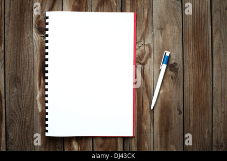 white paper on the wooden table Stock Photo