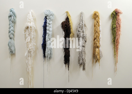 Colorful yarns or balls of wool for knitting on shelves in the haberdashery  shop. Knitwork handcraft concept Stock Photo - Alamy