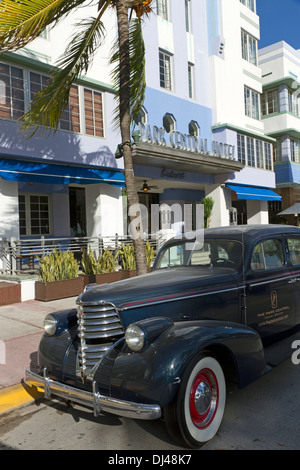 Vintage car parked outside Park Central hotel on Miami's Ocean Drive, South Beach Stock Photo