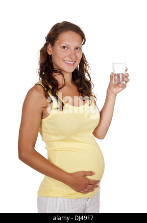 pregnant woman with water glas Stock Photo