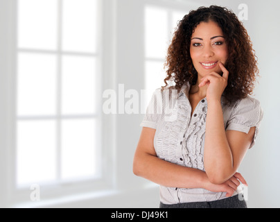 Happy business woman in new office Stock Photo