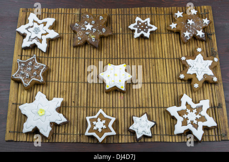 Traditional snowflake shaped Christmas gingerbread cookies Stock Photo