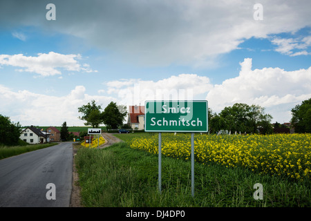 Bilingual German - Polish language city sign, Scmicz - Schmitsch, Opole Voivodship, Poland Stock Photo