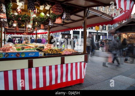 Pick 'n' mix sweets Christmas Shops and Shoppers Temporary candy stalls vending Christmas food merchandise in Church Street, Liverpool, United Kingdom, which were trading as normal despite the collapse of a wooden chalet structure yesterday.  Liverpool’s city centre Christmas Market winter village is said to be its best yet and with late night shopping from Thursday 10th November. Stock Photo