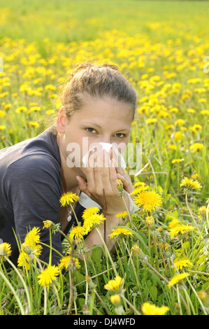 young woman with handkerchief on a meadow Stock Photo