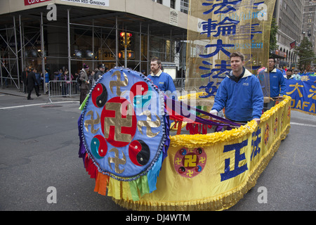 Falun Gong or Falun Dafa practitioners march in the Veterans Day Parade in New York city. Stock Photo