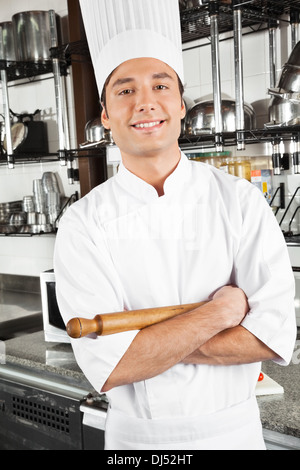 Happy Chef Standing With Arms Crossed Stock Photo