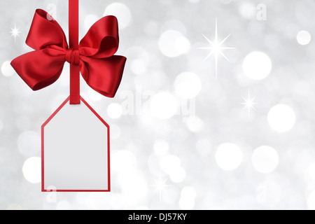 Bow with tag on abstract background Stock Photo