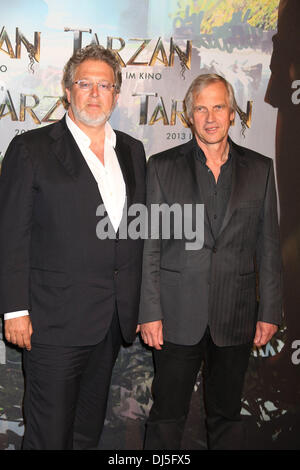 Producer Martin Moszkowicz (l) and director Reinhard Klooss attend a press conference to promote their new movie 'Tarzan' which will start filming at Bavaria Film Studios Munich, Germany - 05.06.12 Stock Photo