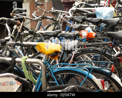 Bicycles chained together in Amsterdam Stock Photo