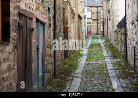 An old cobbled back street in Alnwick, Northumberland, UK. Stock Photo