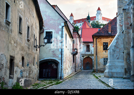 Street of Bratislava old town. Bratislava castle on top Stock Photo