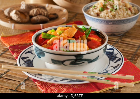 Sweet and sour chicken with egg fried rice. Chinese food. Stock Photo