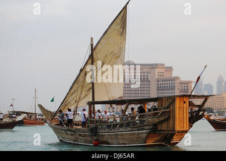 DOHA, Qatar, Nov 21, 2012: A Bahraini dhow sets sail during the 3rd Annual Dhow Festival at Katara cultural village, on the outskirts of the Qatari capital Credit:  Art of Travel/Alamy Live News Stock Photo