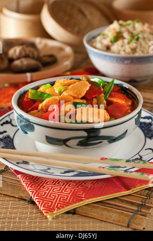 Sweet and sour chicken with egg fried rice. Chinese food. Stock Photo