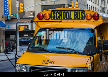 A close up view of a yellow school bus in Manhattan, New York. Shot in 2013. Stock Photo