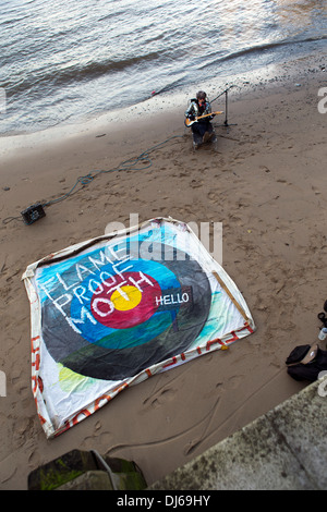 Flame Proof Moth (also known as Tim Siddall), performing in the River Thames, London. Stock Photo