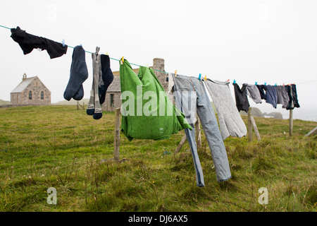 Clothes on washing line in the rain Stock Photo