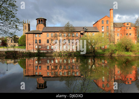 Spring view of the Silk Mill World Heritage Site on the river Derwent, Derby City Centre, Derbyshire, England, UK Stock Photo