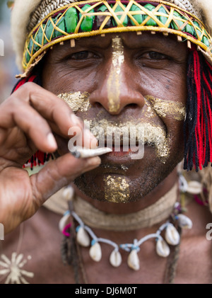Goroka Province Singsing Group Member Smoking, Goroka Show, Papua New Guinea Stock Photo