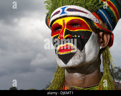 Tribal man  with face paint at Goroka Show Singsing  Papua New Guinea Stock Photo