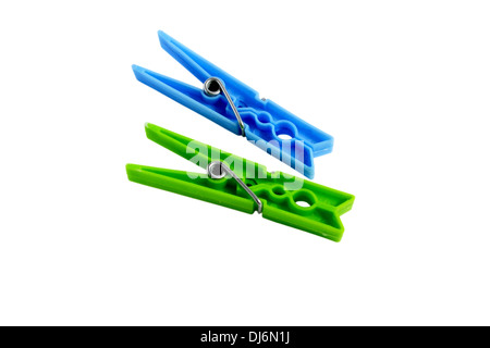 close up of green clothes peg or clothes pin isolated on white