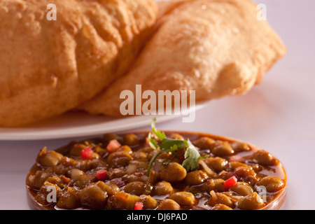 Chola Batura - Batura is a traditional North Indian Punjabi classic bread savored with Chola - together called as “Chola Batura” Stock Photo