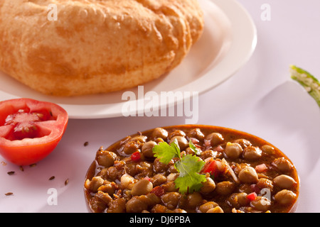 Chola Batura - Batura is a traditional North Indian Punjabi classic bread savored with Chola - together called as “Chola Batura” Stock Photo