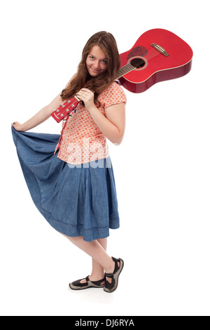 Retro teenage girl with red guitar posing - isolated Stock Photo