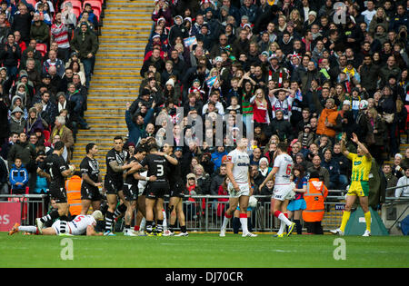 London, UK. 23rd Nov, 2013. New Zealand celebrate their first try during the Rugby League World Cup Semi Final between England and New Zealand from Wembley Stadium. Credit:  Action Plus Sports/Alamy Live News Stock Photo