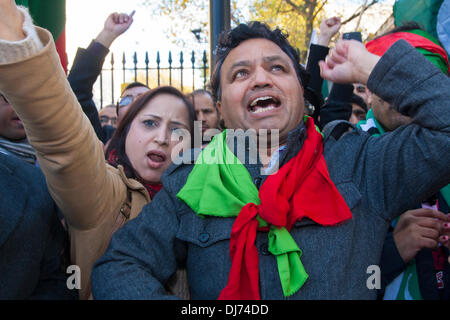 London, November 23rd 2011. Protesters chant slogans before their  march from Downing Street to the US embassy in protest against drone attacks that kill innocent civilians. Credit:  Paul Davey/Alamy Live News