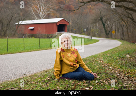 Ninety Year Old Woman Posing for Photograph in Front of the Busching Covered Bridge in Ripley County, Indiana