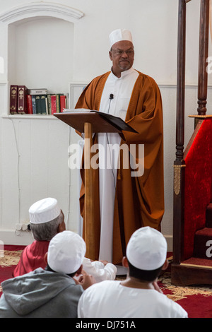 South Africa, Cape Town. A Visiting Imam gives the Friday Sermon before Prayers at the Al-Azhar Mosque. Stock Photo