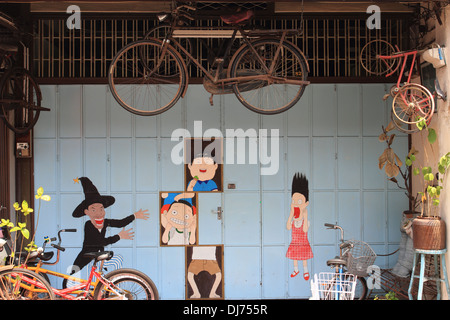 hanging cicycle, shopfront, komtar, George town, Penang,Malaysia Stock Photo