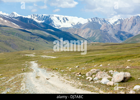 Soil road in high mountains. Tien Shan Stock Photo