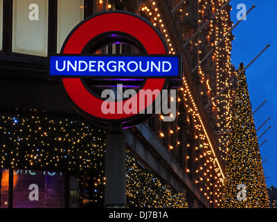 London Underground sign at Harrods Knightsbridge Brompton road , West London , England , UK at dusk Stock Photo
