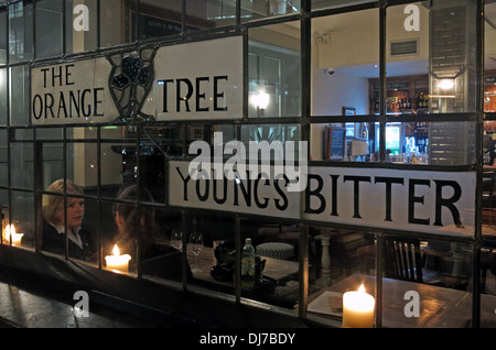 Window stained glass Orange Tree Pub Richmond SW London England UK at night Stock Photo