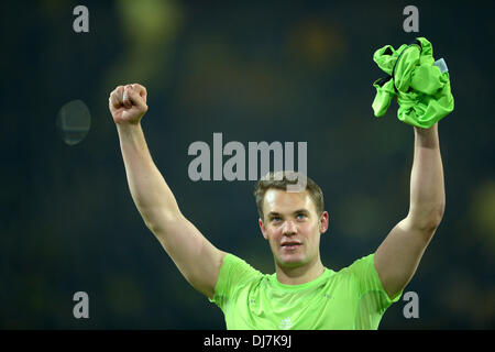 Dortmund, Germany. 23rd Nov, 2013. Munich's goalkeeper Manuel Neuer cheers after his team won the Bundesliga soccer match between Borussia Dortmund and Bayern Munich in Dortmund, Germany, 23 November 2013. Photo: Federico Gambarini/dpa/Alamy Live News Stock Photo