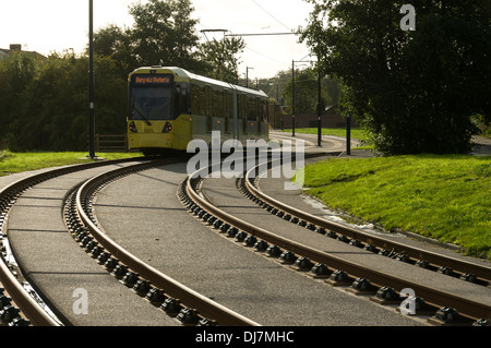 Metrolink tram on the East Manchester Line, Audenshaw, Ashton under Lyne, Tameside, Manchester, England, UK Stock Photo