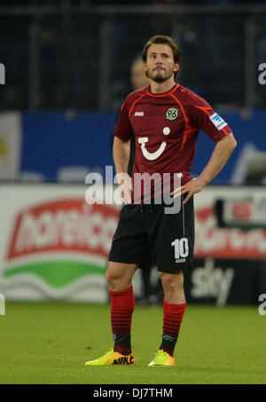 Hamburg, Germany. 24th Nov, 2013. Hanover's Szabolcs Huszti stands on the pitch after the 3-1 goal during the German Bundesliga match between Hamburger SV and Hannover 96 at Imtech Arena in Hamburg, Germany, 24 November 2013. Photo: PETER STEFFEN (ATTENTION: Due to the accreditation guidelines, the DFL only permits the publication and utilisation of up to 15 pictures per match on the internet and in online media during the match.)/dpa/Alamy Live News Stock Photo