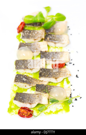 baked black cod fish on a white background in the restaurant Stock Photo