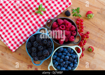 Three bowls of fresh berries Stock Photo