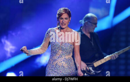 Braunschweig, Germany. 23rd Nov, 2013. Schlager singer Andrea Berg performs for the ZDF entertainment show 'Willkomen bei Carmen Nebel' (Welcome to Carmen Nebel) at the Volkswagenhalle in Braunschweig, Germany, 23 November 2013. Photo: BODO SCHACKOW NO WIRE SERVICE/dpa/Alamy Live News Stock Photo